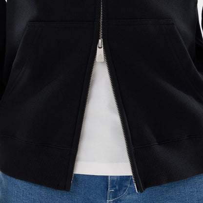 The model is wearing this MLB Word Art New York Yankees 2 Way Full Zip Hoodie in black. 6