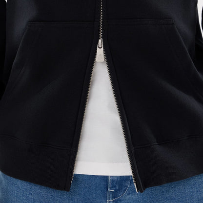The model is wearing this MLB Word Art New York Yankees 2 Way Full Zip Hoodie in black. 6