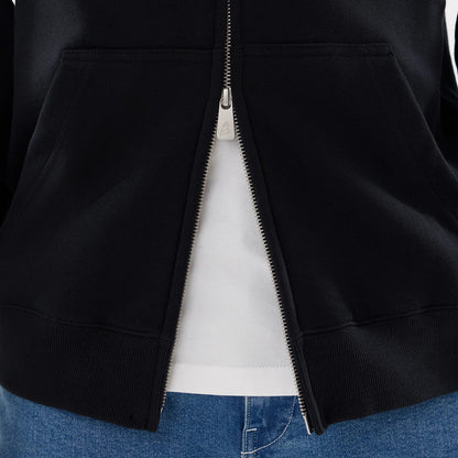 The model is wearing this MLB Word Art New York Yankees 2 Way Full Zip Hoodie in black. 6