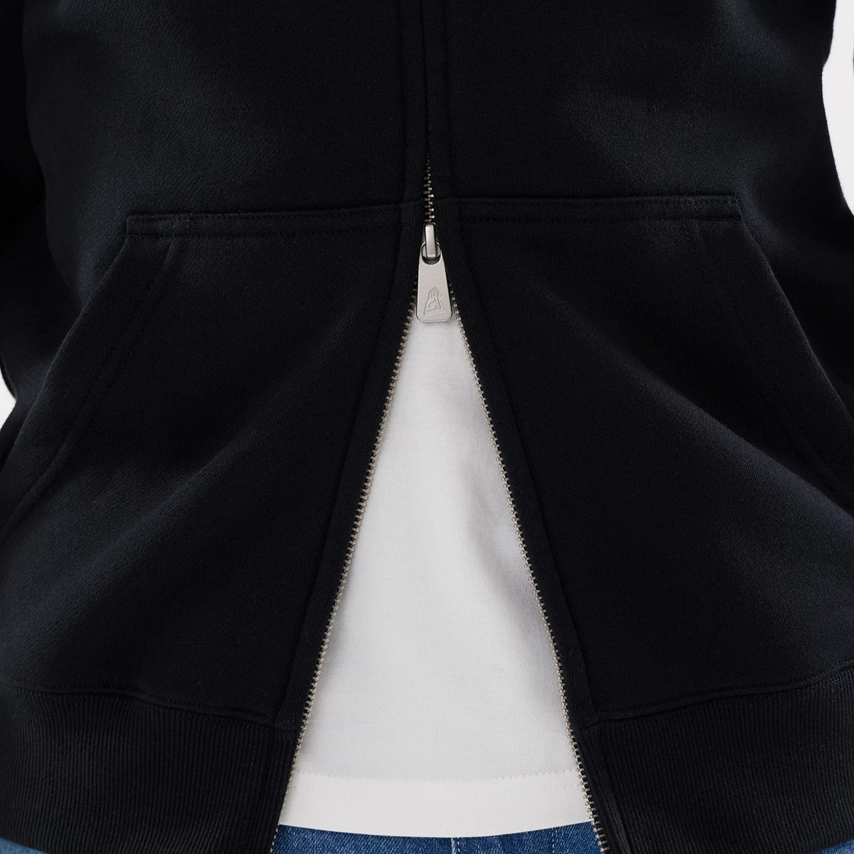 The model is wearing this MLB Word Art Las Vegas Raiders 2 Way Full Zip Hoodie in black. 6