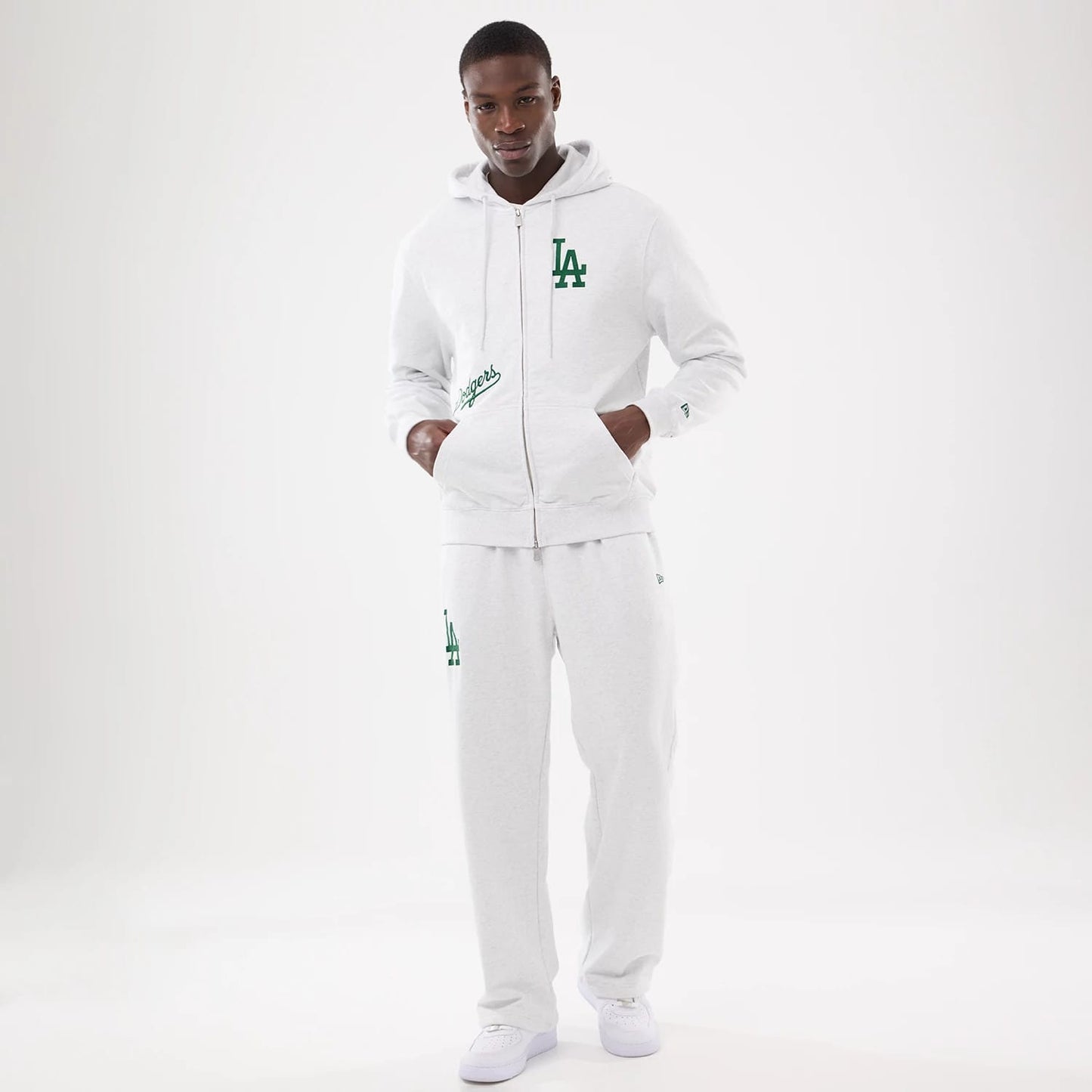 The model is wearing this MLB Comfort LA Dodgers 2 Way Full Zip Hoodie in grey. 7