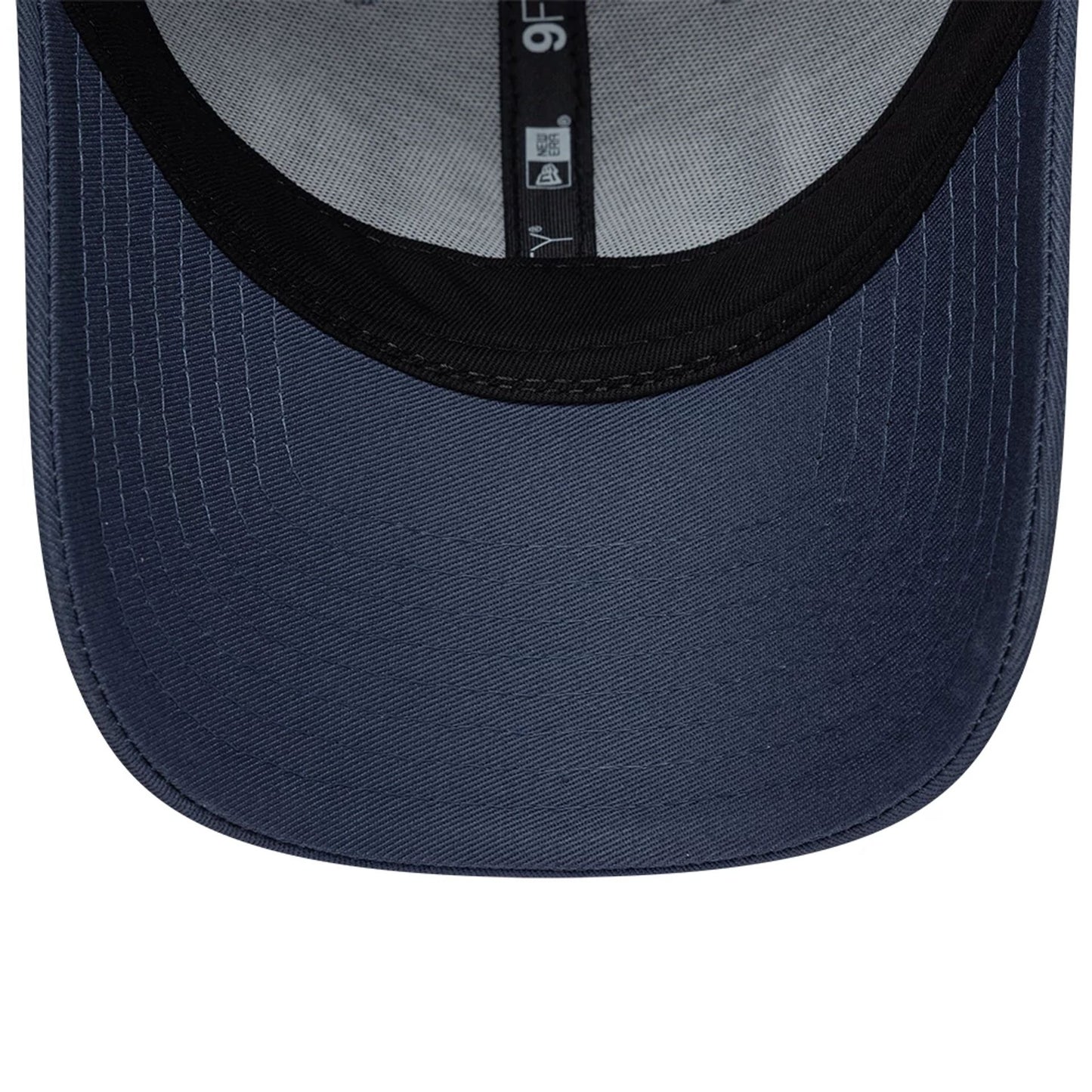 Pictured is this New Era Street Archived 9FORTY cap in dark blue. 7