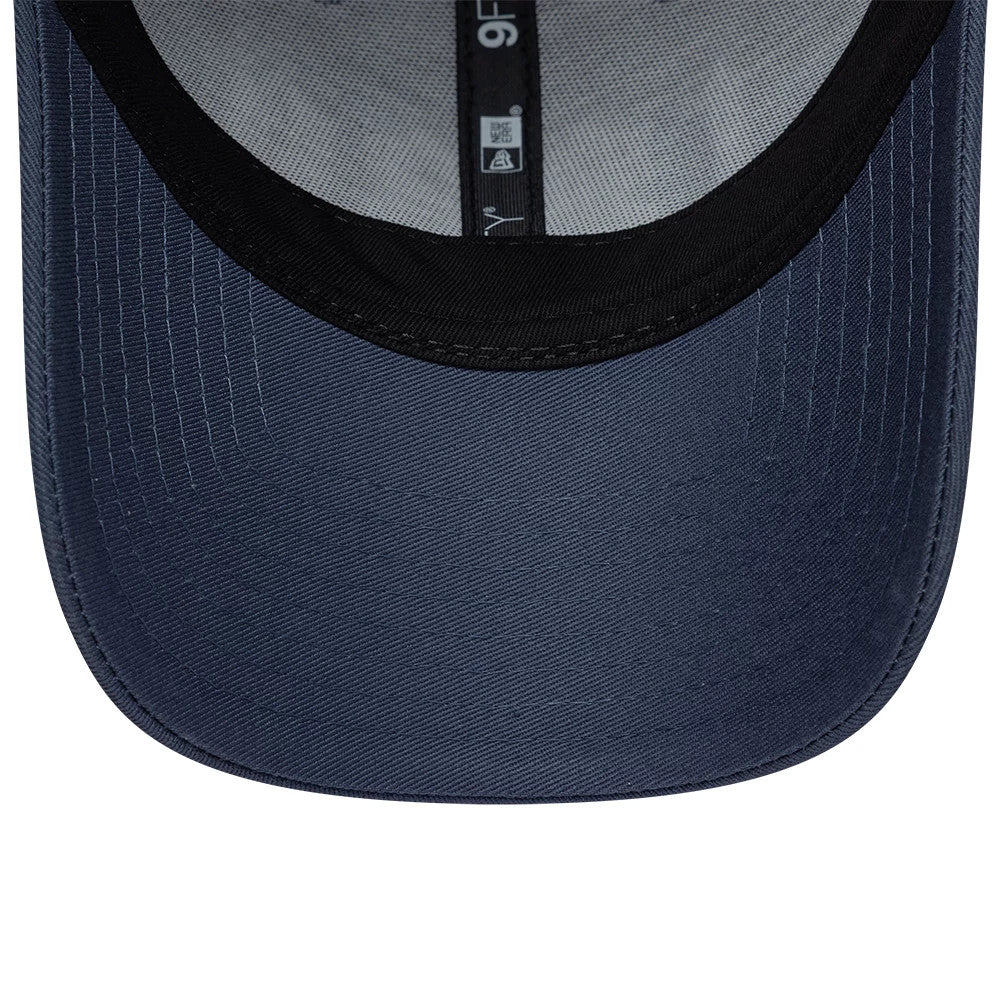Pictured is this New Era Street Archived 9FORTY cap in dark blue. 7