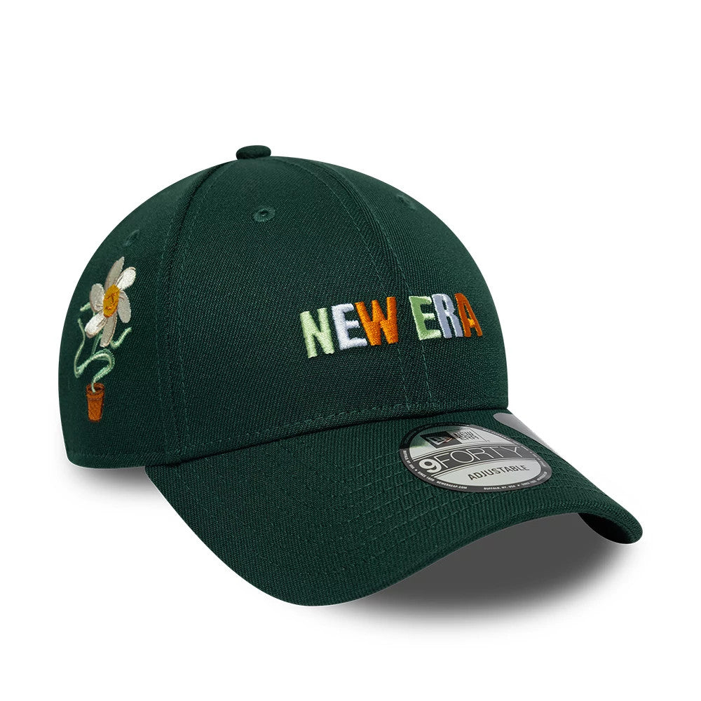 New Era Earth Day Dark Green New Era 9FORTY Adjustable Cap, front view with multicoloured embroidered NEW ERA lettering on the front panel, a flower pot design on the left side, and a 9FORTY size sticker on the visor.