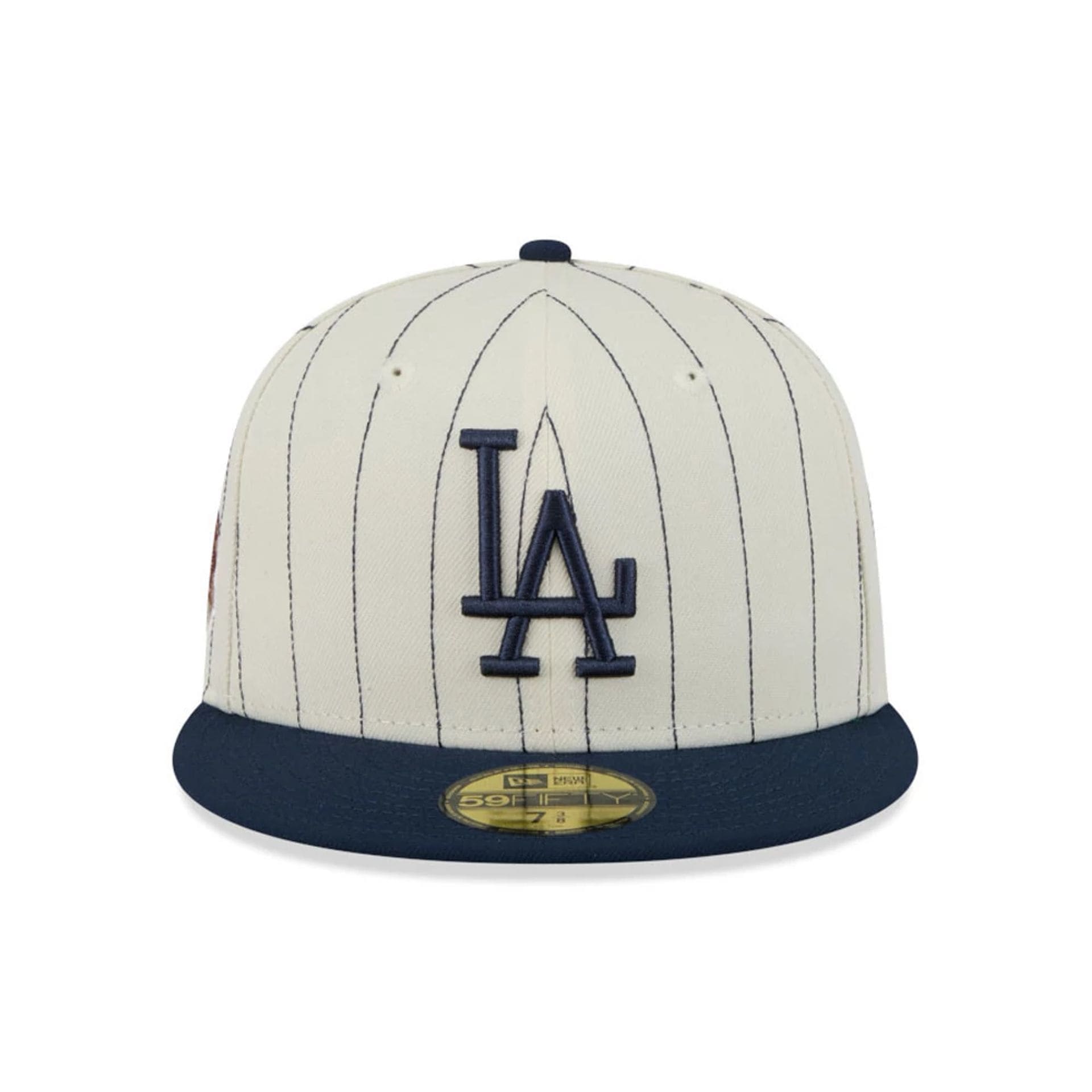 Pictured is this MLB Stripes LA Dodgers 59FIFTY Fitted cap in cream. 3