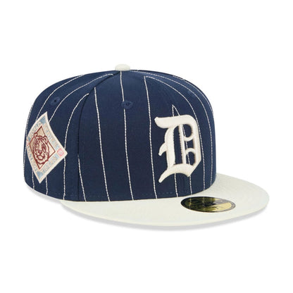 Pictured is this MLB Stripes Detroit Tigers 59FIFTY Fitted cap in dark blue. 1