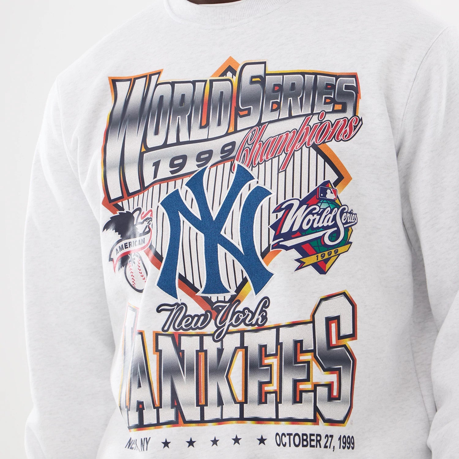The model is wearing this MLB Retro New York Yankees Oversized Crew Neck Sweater in White 4