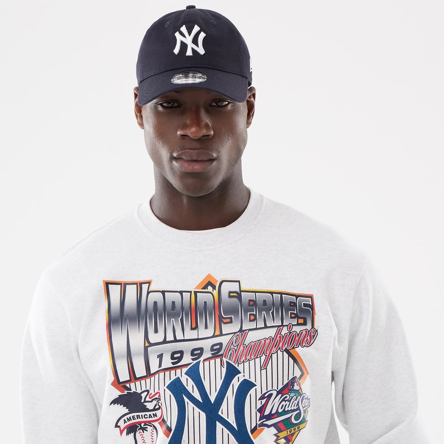 The model is wearing this MLB Retro New York Yankees Oversized Crew Neck Sweater in White 6