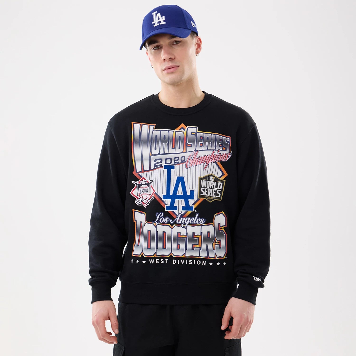 The model is wearing this MLB Retro LA Dodgers Oversized Crew Neck Sweater in black. 1