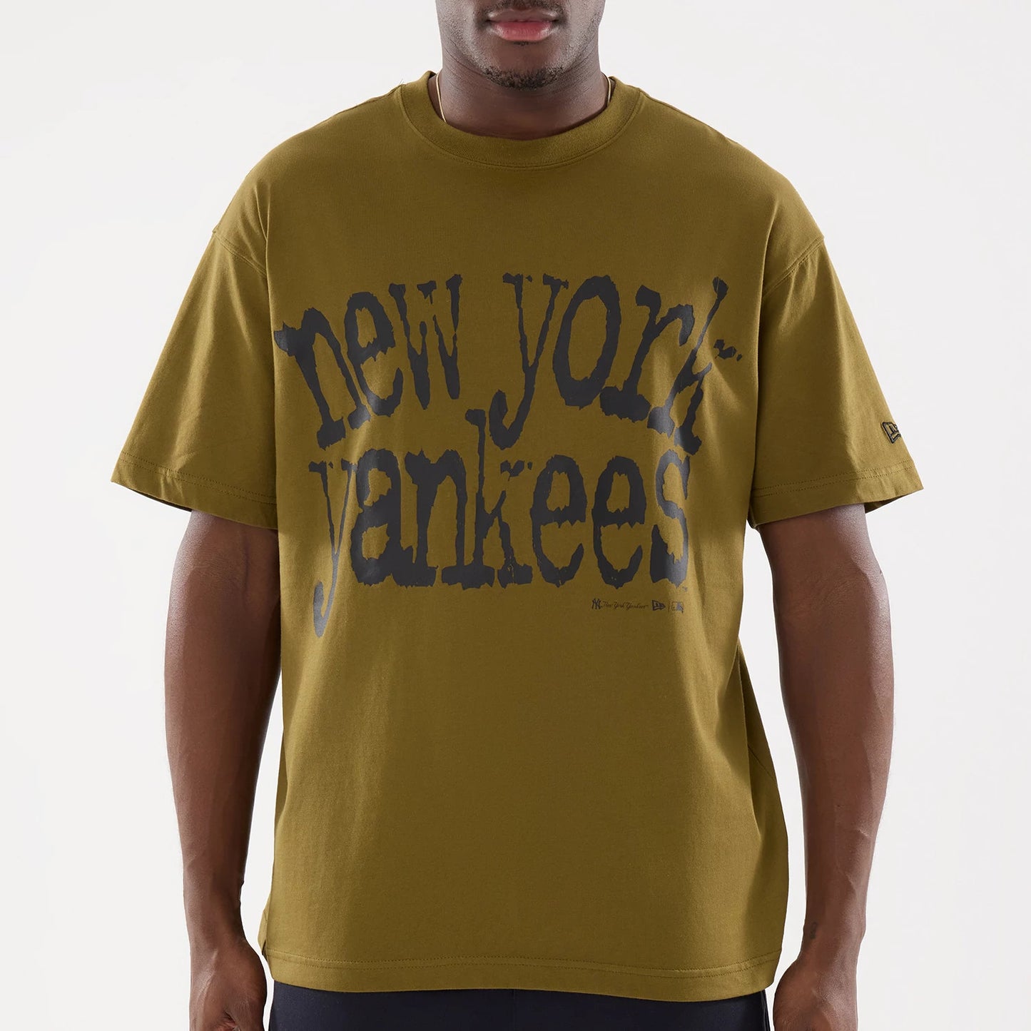 The model is wearing this MLB New York Yankees T-Shirt in Brown. 4