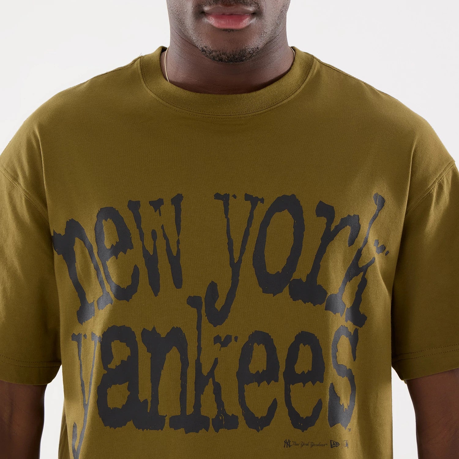 The model is wearing this MLB New York Yankees T-Shirt in Brown. 3