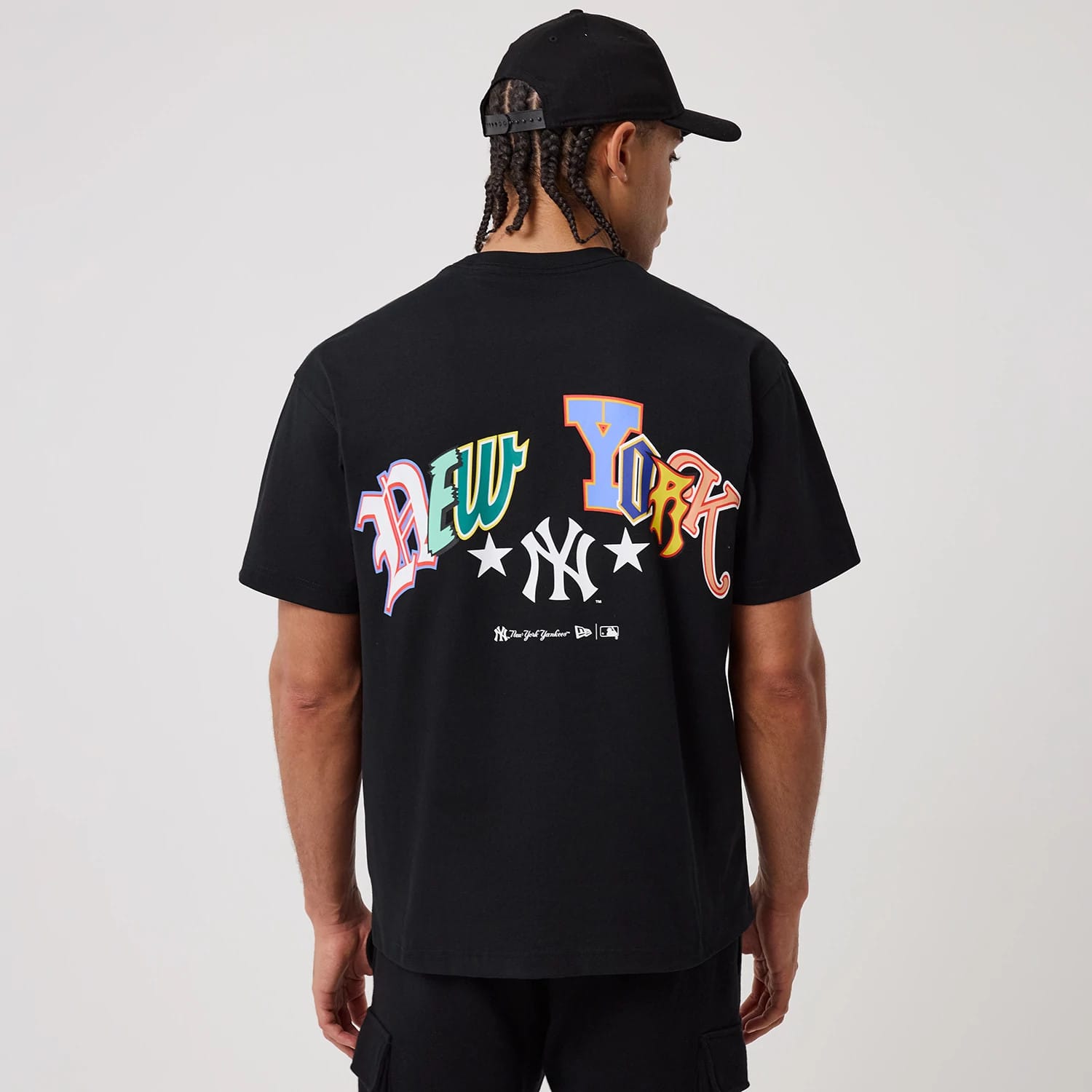The model is wearing this MLB Word Art New York Yankees T-Shirt in black. 2