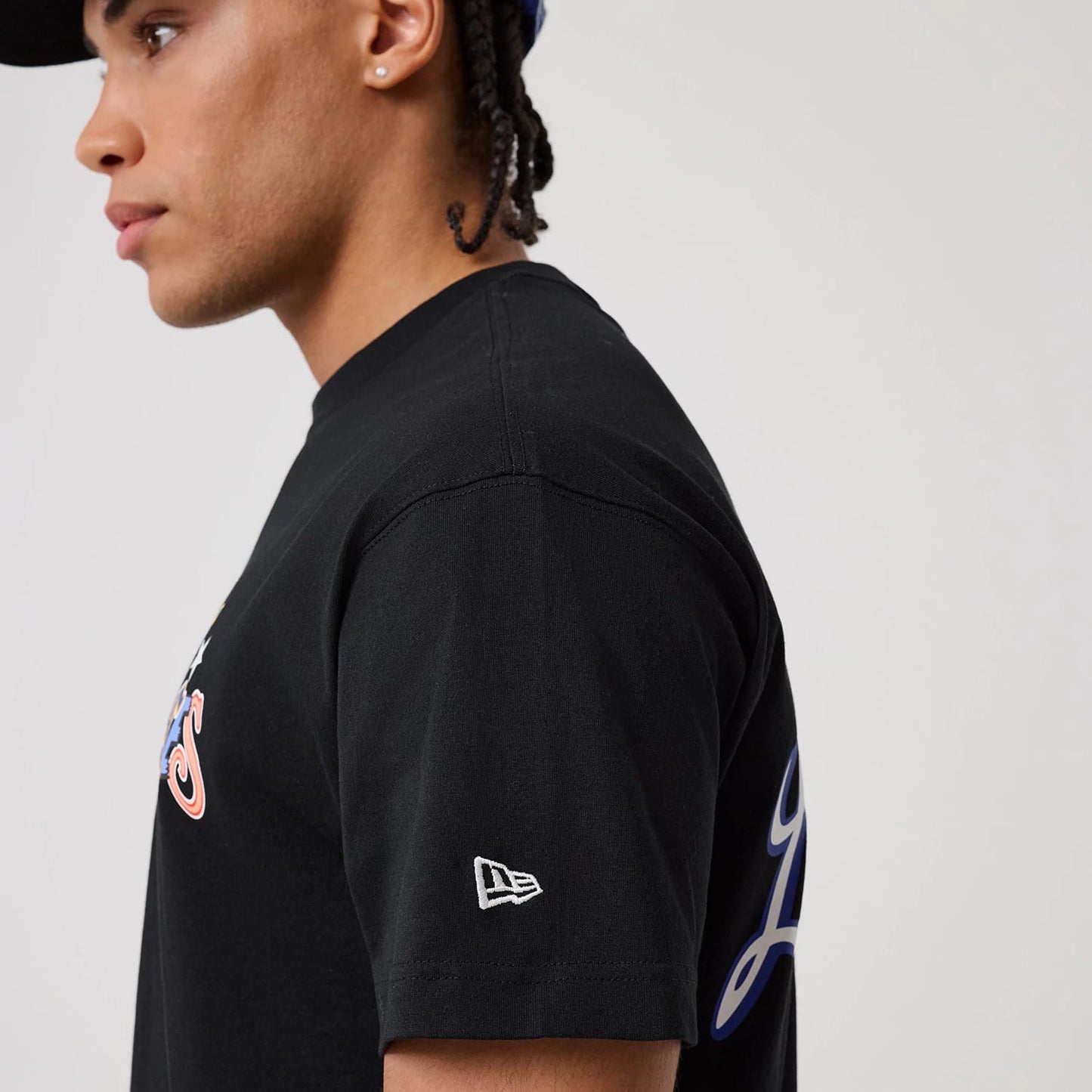 The model is wearing this MLB Word Art LA Dodgers T-Shirt in black. 5