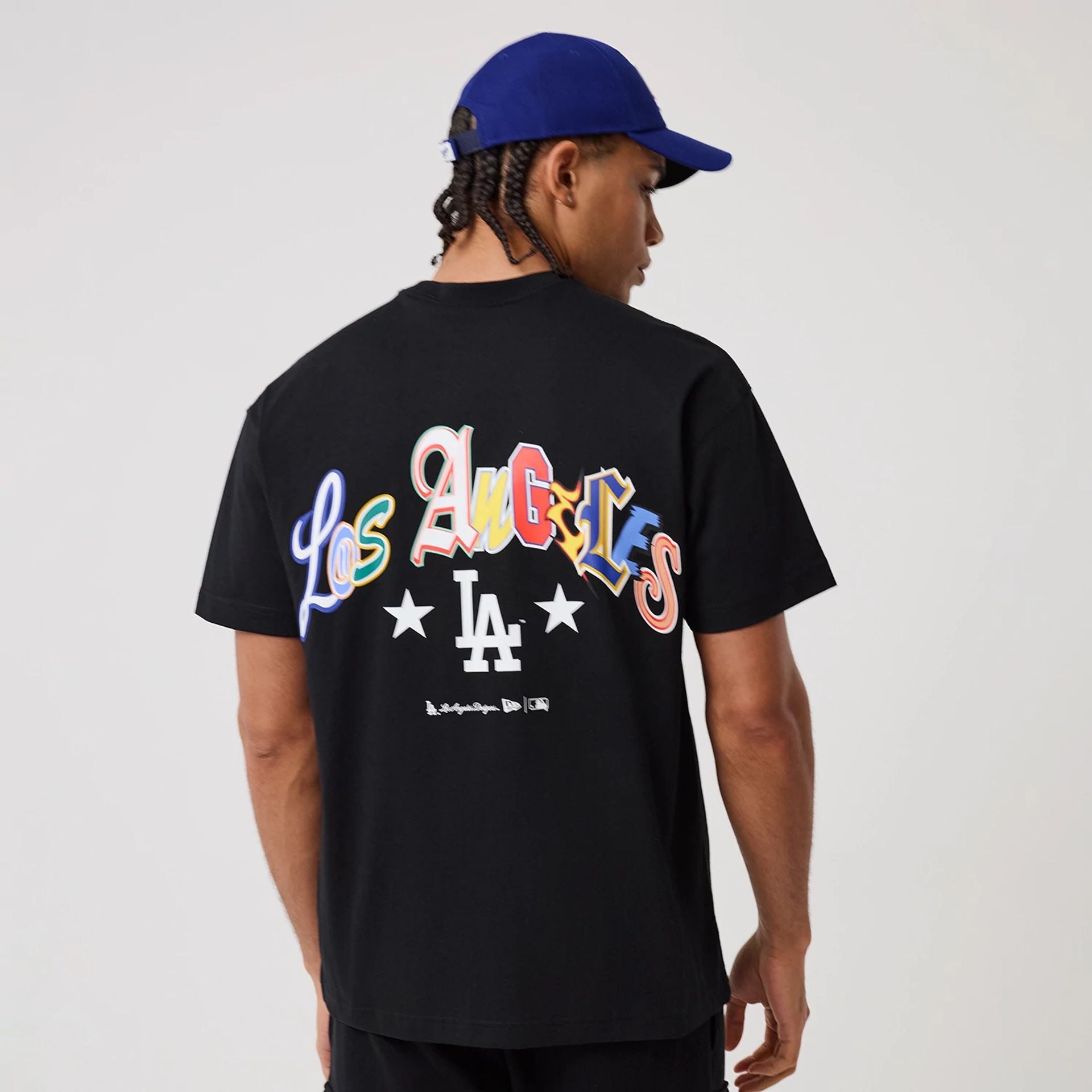 The model is wearing this MLB Word Art LA Dodgers T-Shirt in black. 2
