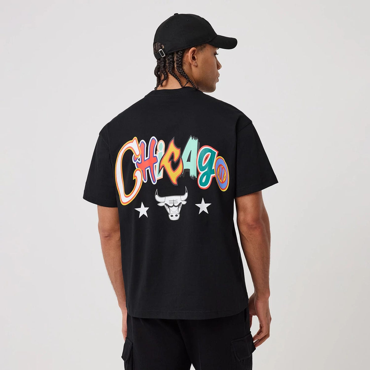 The model is wearing this MLB Word Art Chicago Bulls T-Shirt in black. 2