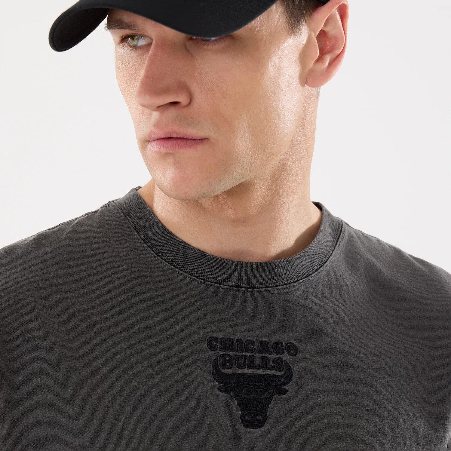 The model is wearing this NBA Shadow Pop Chicago Bulls T-Shirt in black. 4
