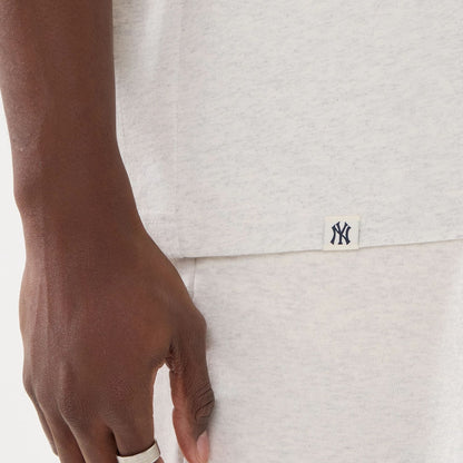 The model is wearing this MLB Comfort New York Yankees T-Shirt in grey. 5