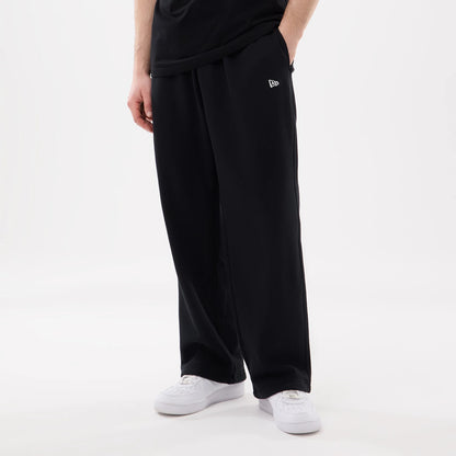 The model is wearing this New Era Straight Legged Joggers in black. 1