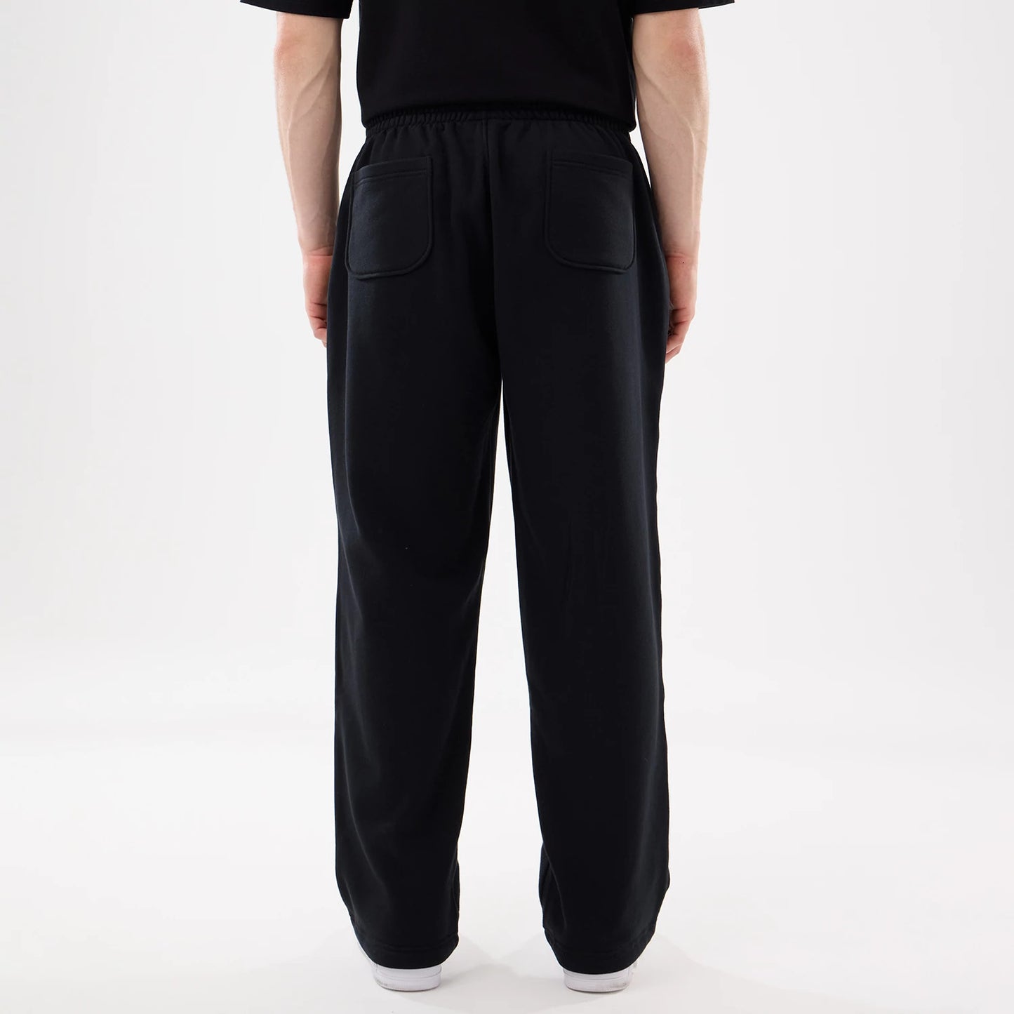 The model is wearing this New Era Straight Legged Joggers in black. 2