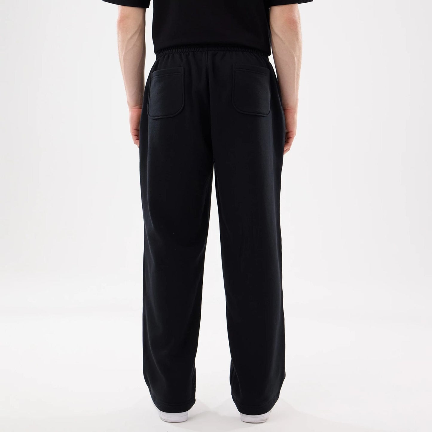 The model is wearing this New Era Straight Legged Joggers in black. 2