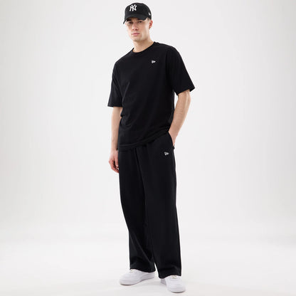 The model is wearing this New Era Straight Legged Joggers in black. 7