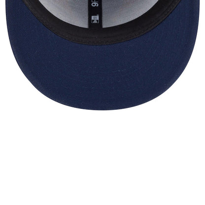 Rick And Morty Dark Blue New Era 9FIFTY Adjustable Cap, inside view showing the black sweatband with a white 9FIFTY label, matching dark blue taping across the crown, and the underside of a blue visor.