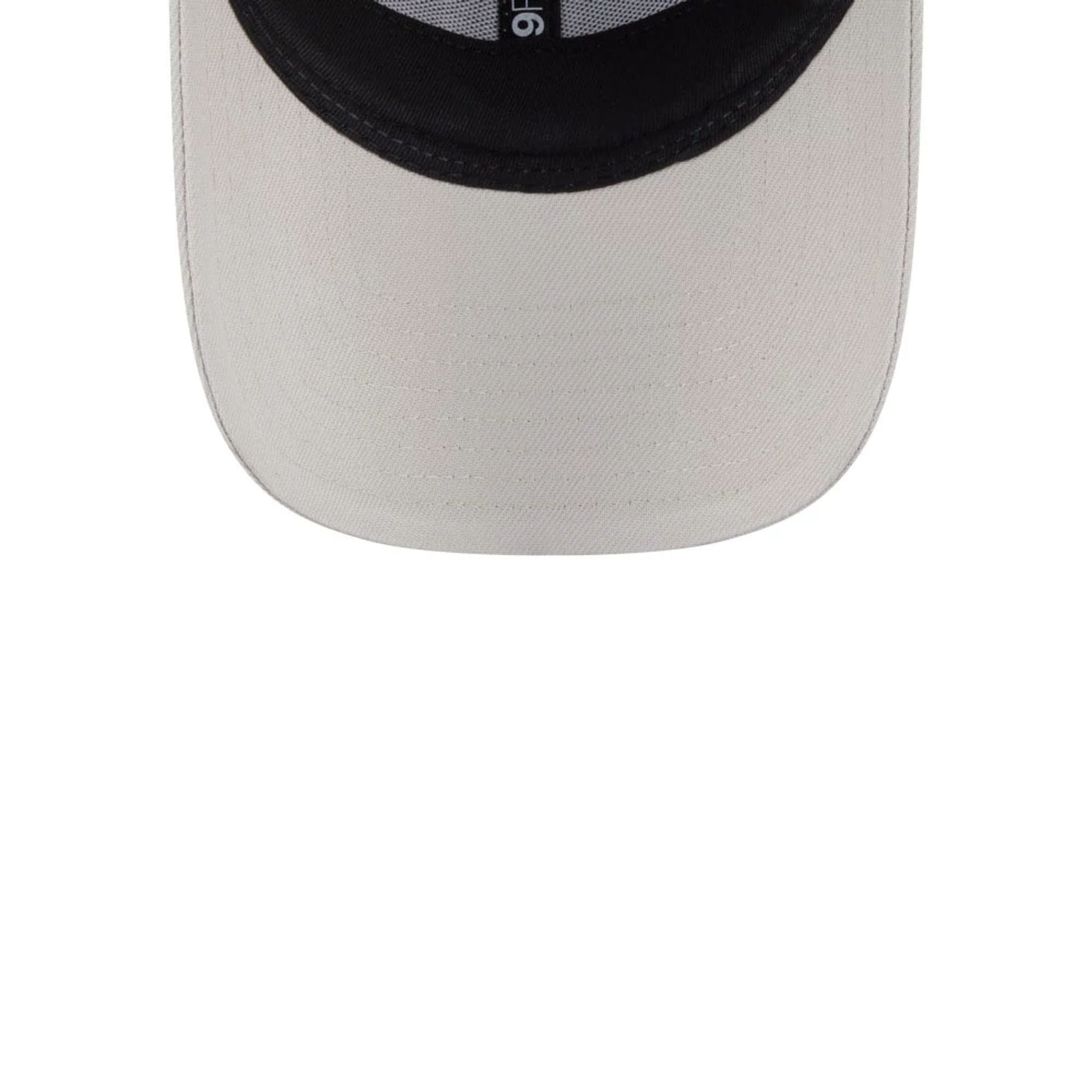 Pictured is this Rick And Morty 9FORTY Adjustable cap in Cream. 6