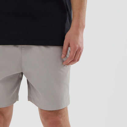 The model is wearing this New Era Urban Core Oversized Shorts in Beige . 5