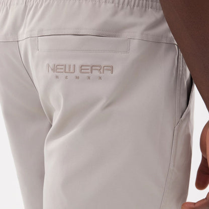 The model is wearing this New Era Urban Core Oversized Shorts in Beige . 6