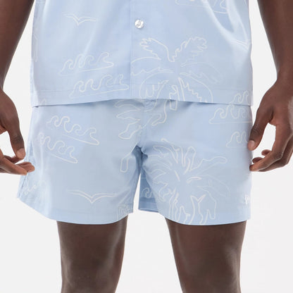 The model is wearing these New Era Resort Oversized Shorts in blue. 5