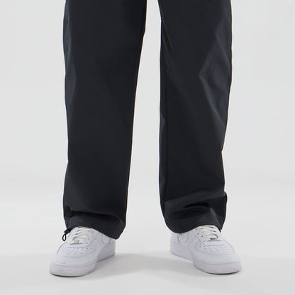 The model is wearing this New Era NEC Logo Straight Leg Joggers in black. 4
