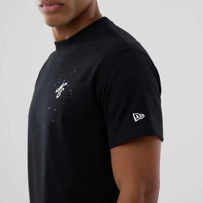 The model is wearing this New Era Zodiac Sign T-Shirt in black. 6