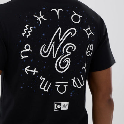 The model is wearing this New Era Zodiac Sign T-Shirt in black. 3