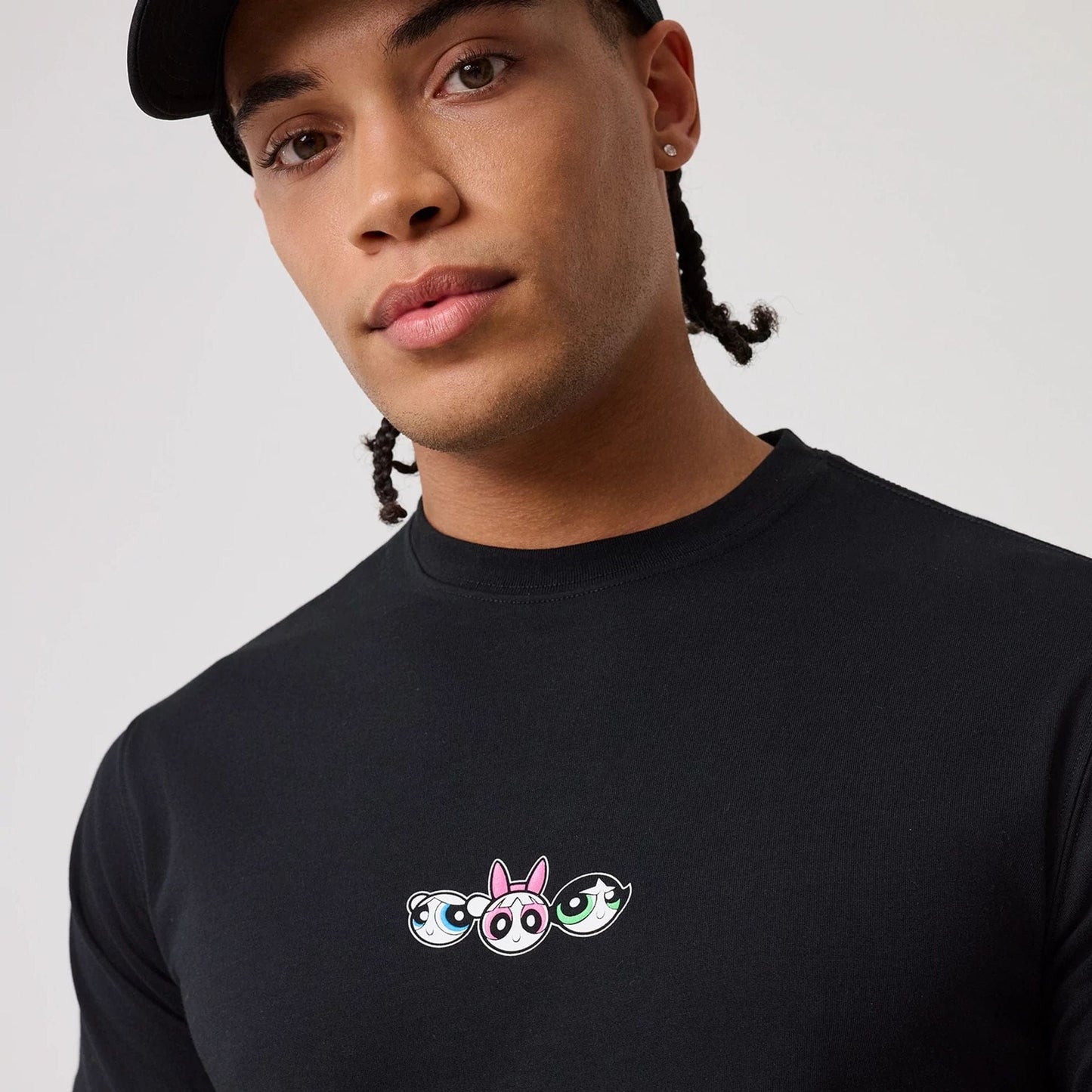 The model is wearing this Powerpuff Girls T-Shirt in black. 6