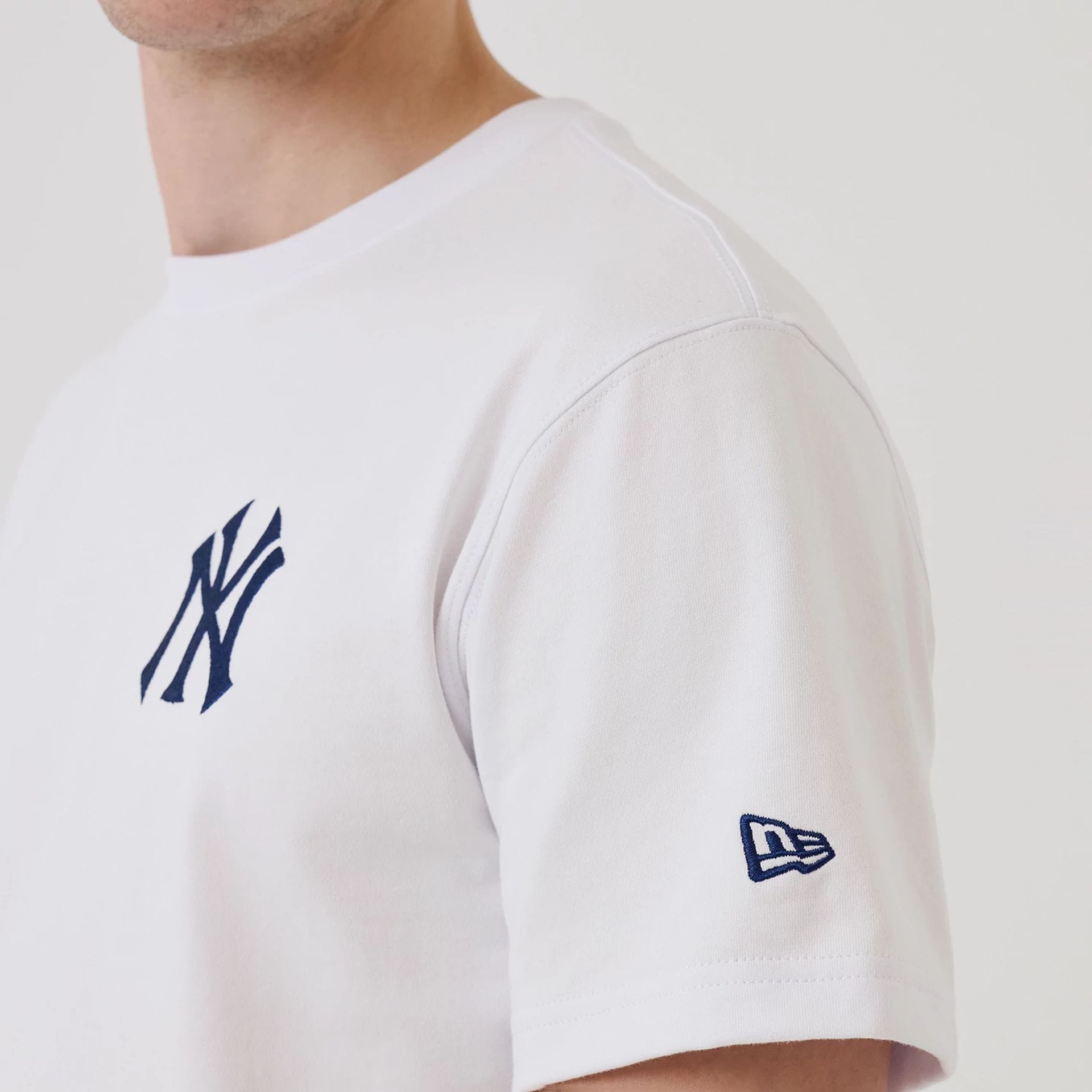 The model is wearing this MLB Sakura New York Yankees T-Shirt in white. 6