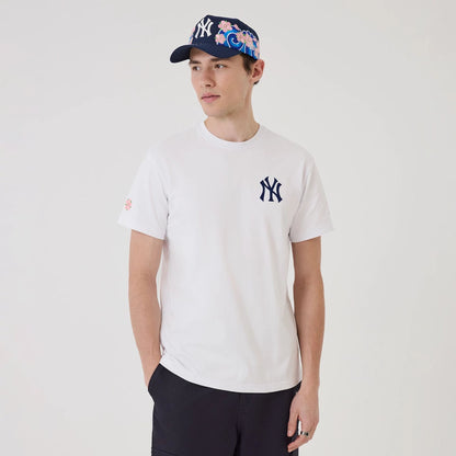 The model is wearing this MLB Sakura New York Yankees T-Shirt in white. 1