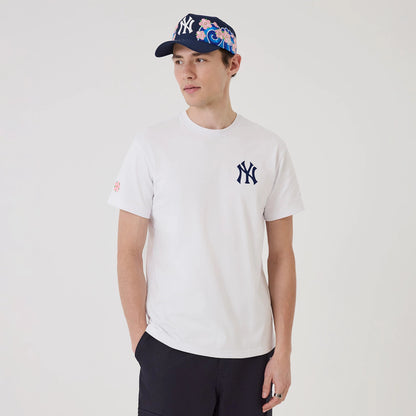 The model is wearing this MLB Sakura New York Yankees T-Shirt in white. 1