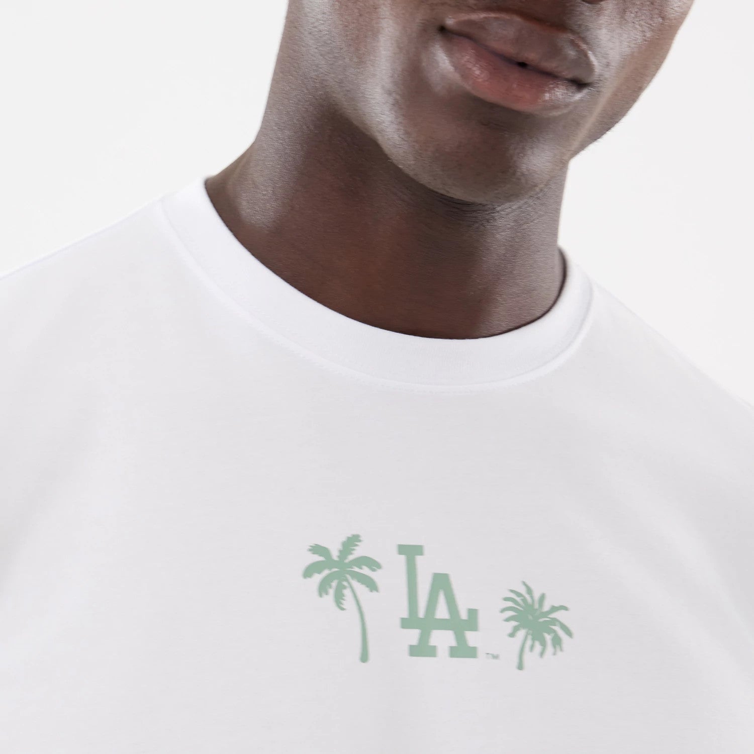 The model is wearing this MLB Resort LA Dodgers T-Shirt in white. 3