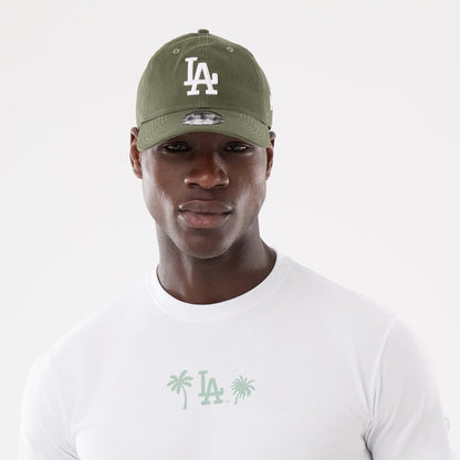 The model is wearing this MLB Resort LA Dodgers T-Shirt in white. 7