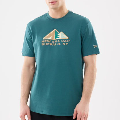 New Era Outdoor Mountain Dark Green T-Shirt, front view showing a large printed design of stylised mountains above text reading 'New Era Cap Buffalo, NY' on the chest and a small raised New Era logo on the left sleeve.