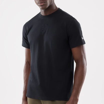 The model is wearing this MLB Cartoon New York Mets T-Shirt in black. 5
