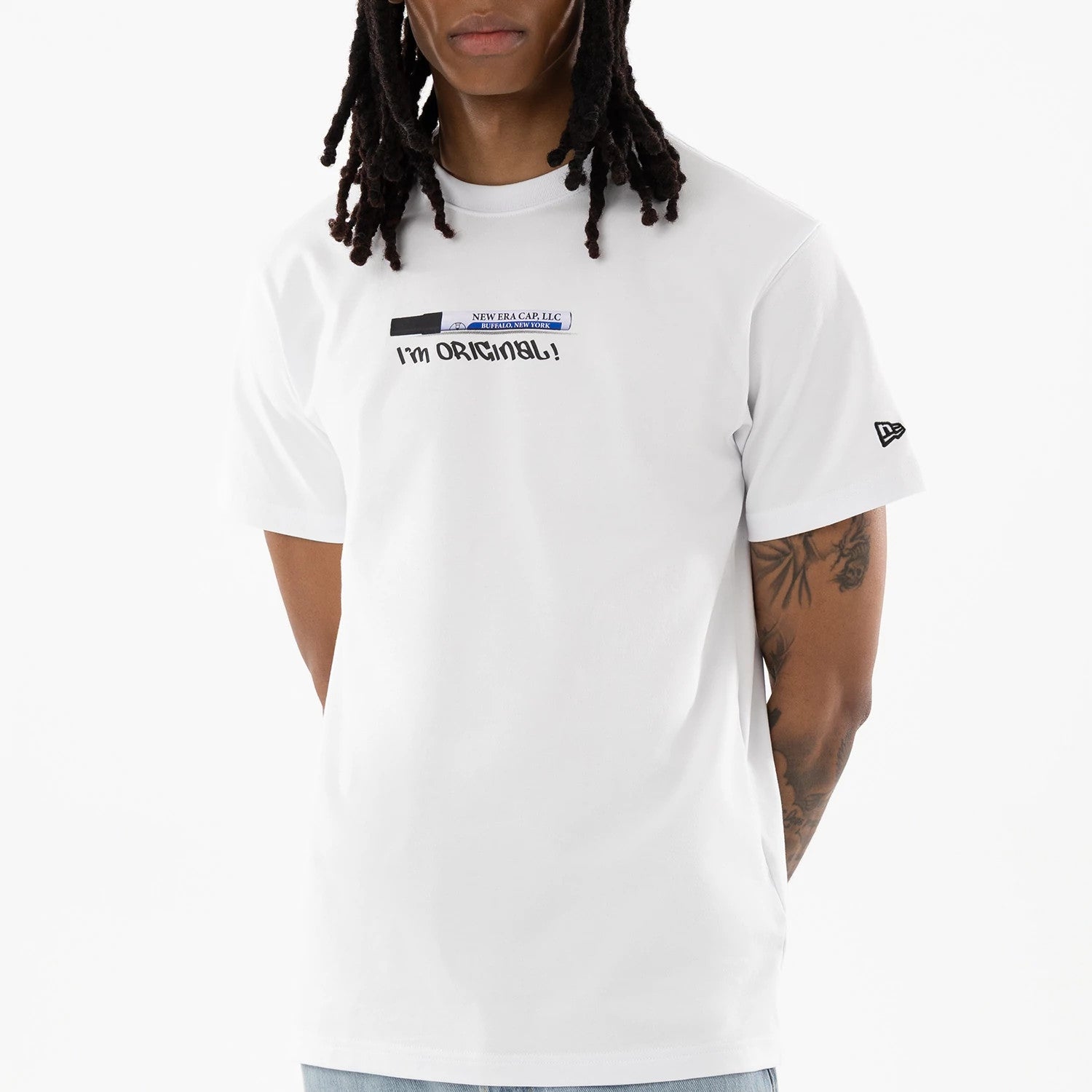 The model is wearing this New Era I Am Original T-Shirt in white. 3