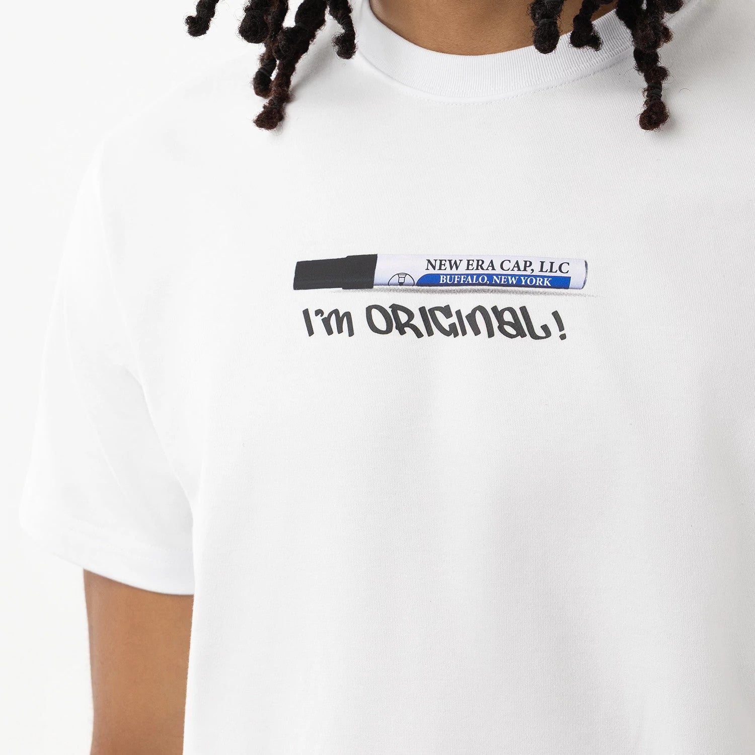 The model is wearing this New Era I Am Original T-Shirt in white. 4
