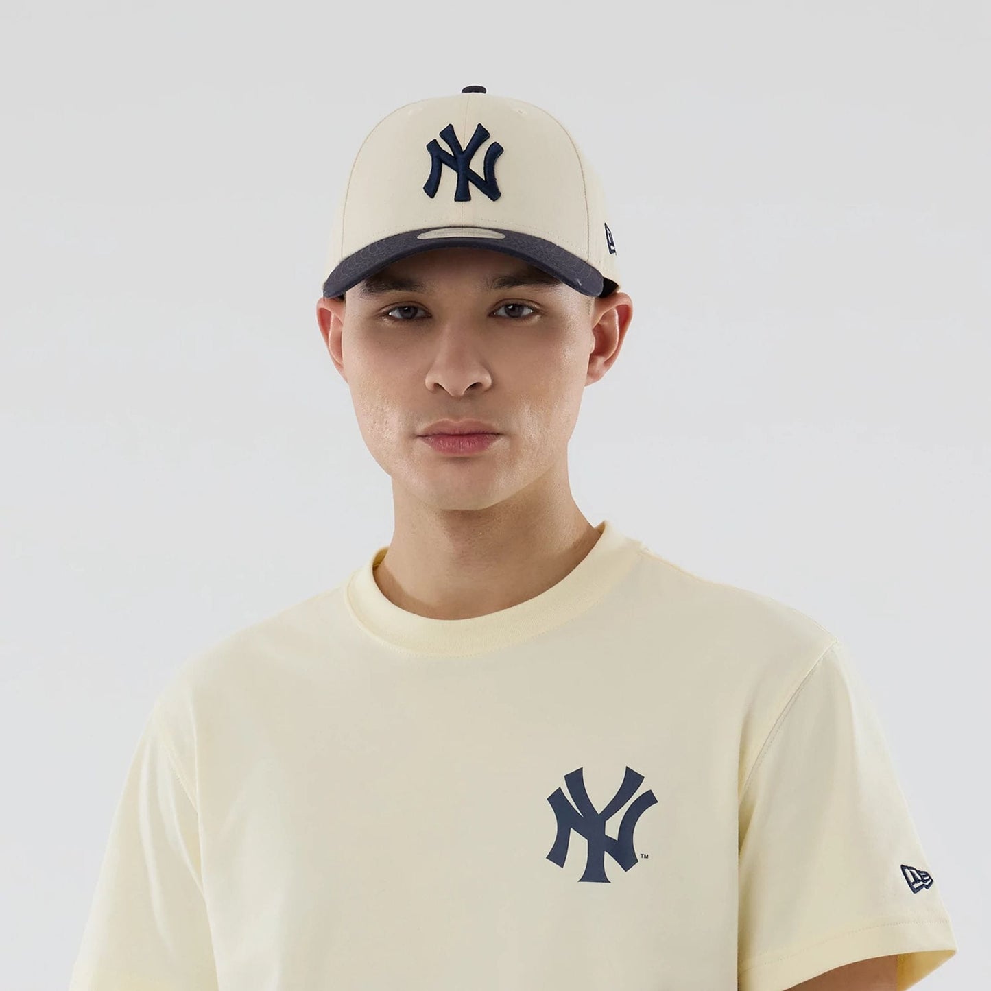 The model is wearing this MLB City Series New York Yankees T-Shirt in cream. 4