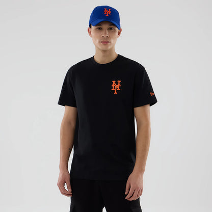 New York Mets MLB City Series Black T-Shirt, on-model view showing a black T-shirt with an orange embossed Mets logo on the chest, paired with a blue cap featuring the same logo, and a raised New Era logo on the sleeve.