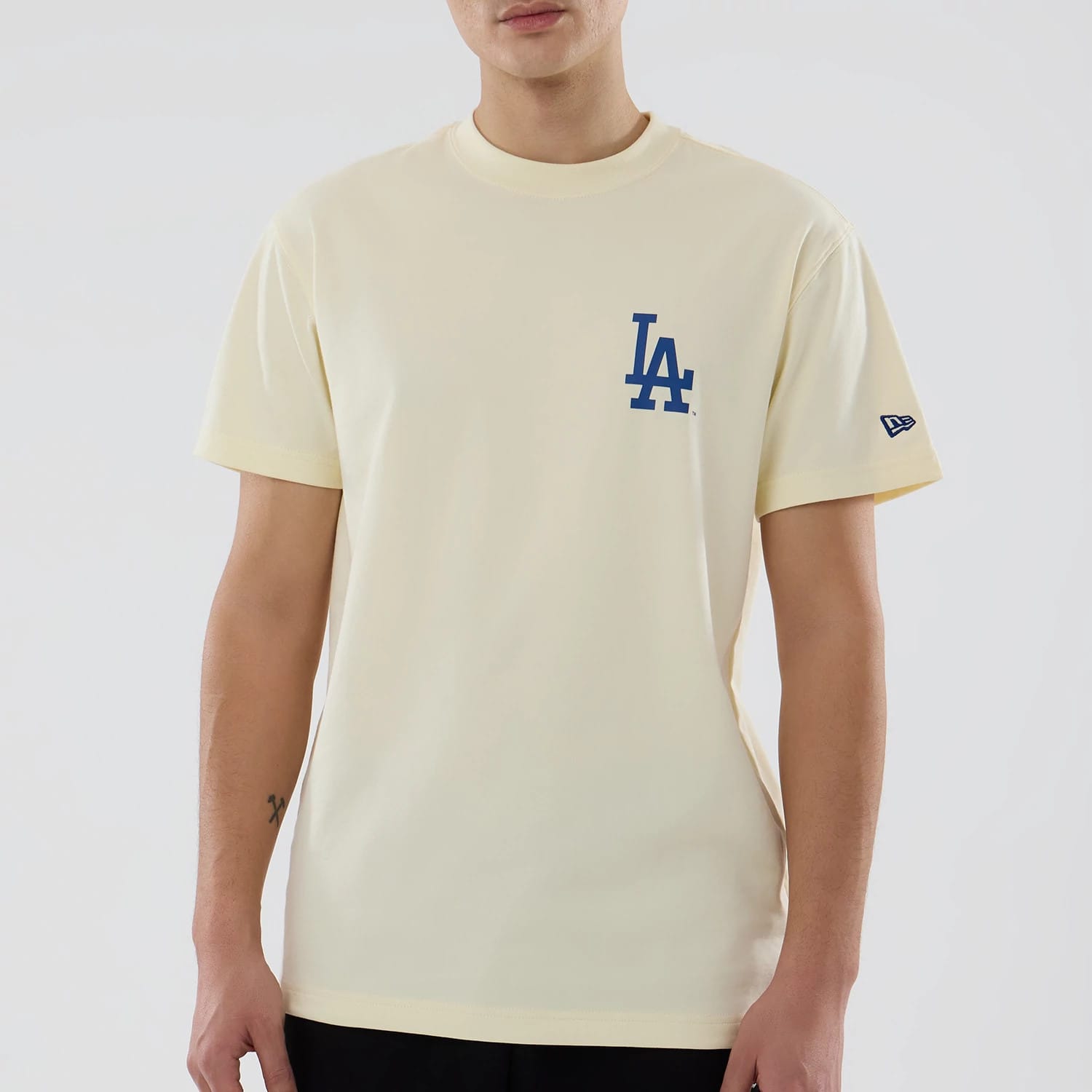 The model is wearing this MLB City Series LA Dodgers T-Shirt in white. 4