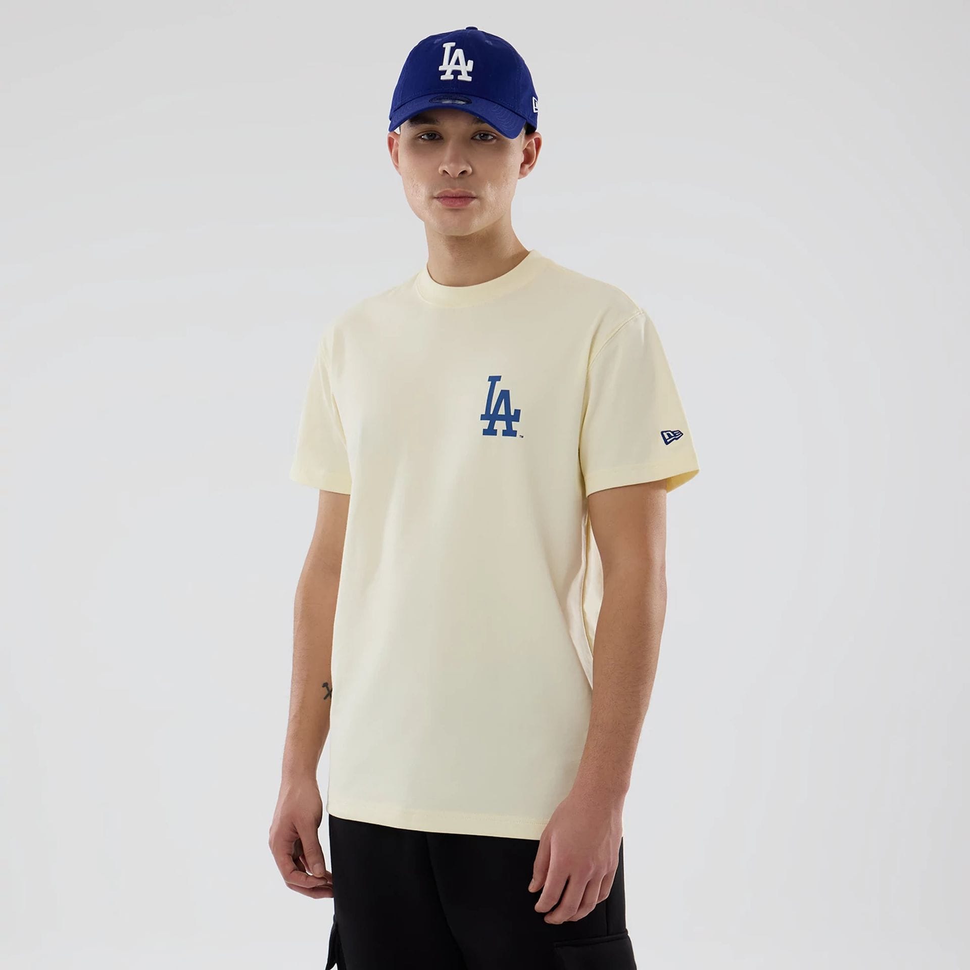 The model is wearing this MLB City Series LA Dodgers T-Shirt in white. 1