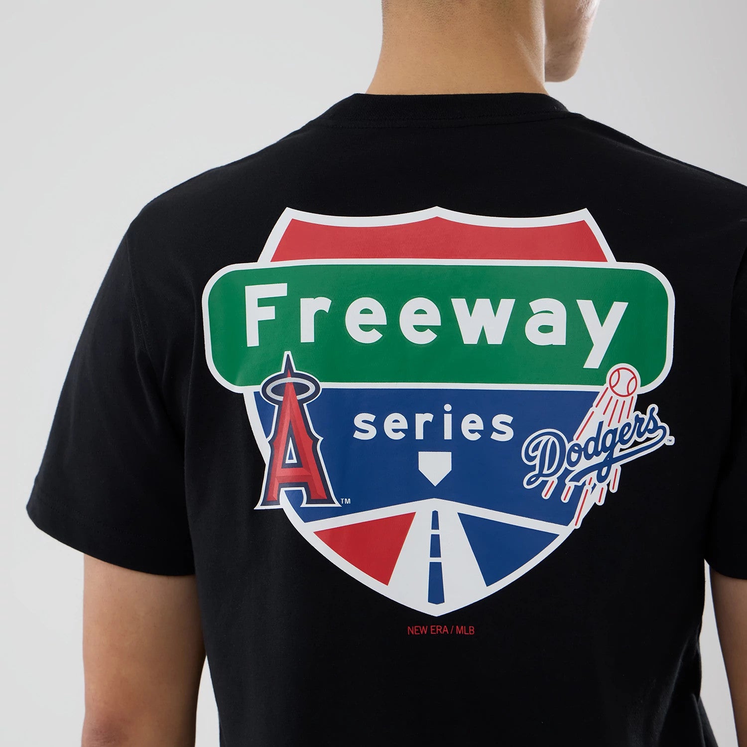 The model is wearing this MLB City Series LA Angels T-Shirt in black. 3