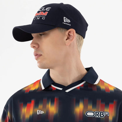 The model is wearing this Red Bull Racing Soccer Jersey in multi. 5