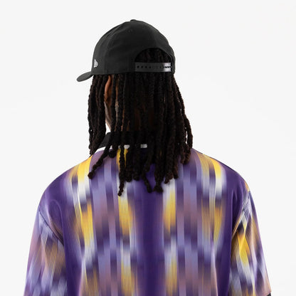 The model is wearing this NBA LA Lakers Soccer Jersey in purple. 7